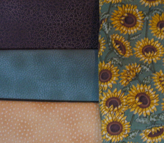 [mystery+quilt+#21+fabrics.jpg]