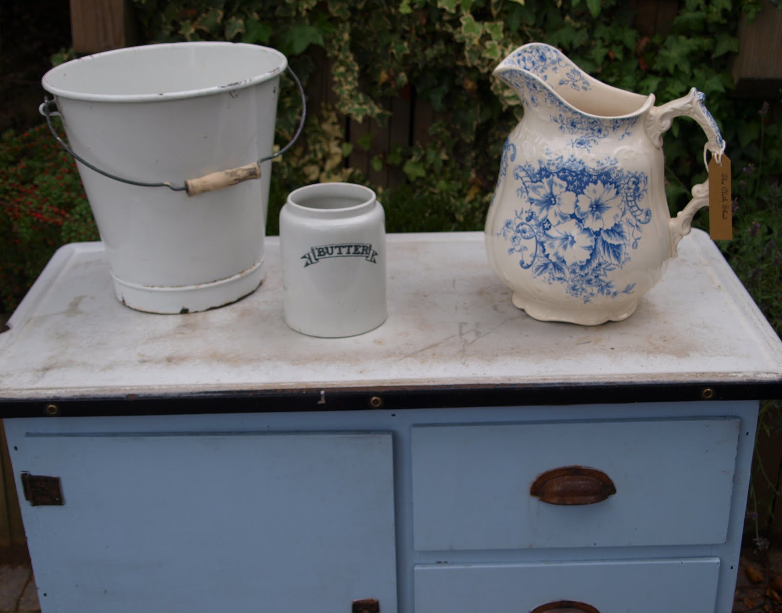 This small kitchen dresser base with battered enamel top would be a 