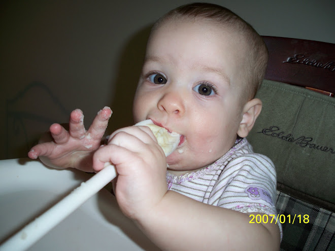 Eating a spoon with mashed potaters:)