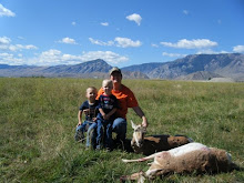 Lori and the boys with her two antelope