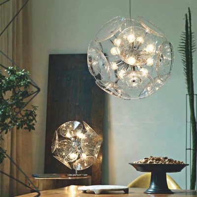 At first glance, you would expect the Mairi glass pendant light to be a