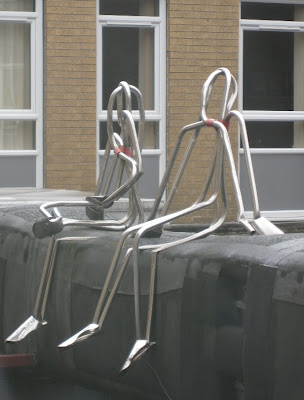 Zimmer frame sculpture of two figures