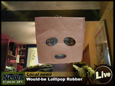 Hilarious photo of me with a bag over my head and holes cut for eyes and mouth