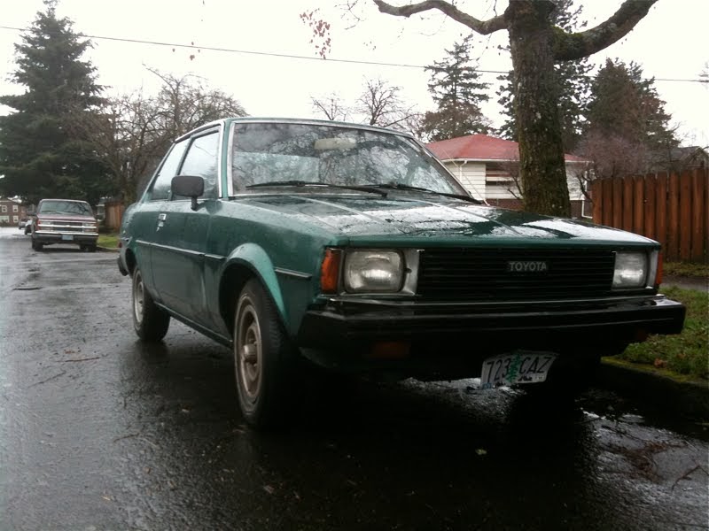 OLD PARKED CARS.: 1981 Toyota Corolla 2 door sedan.