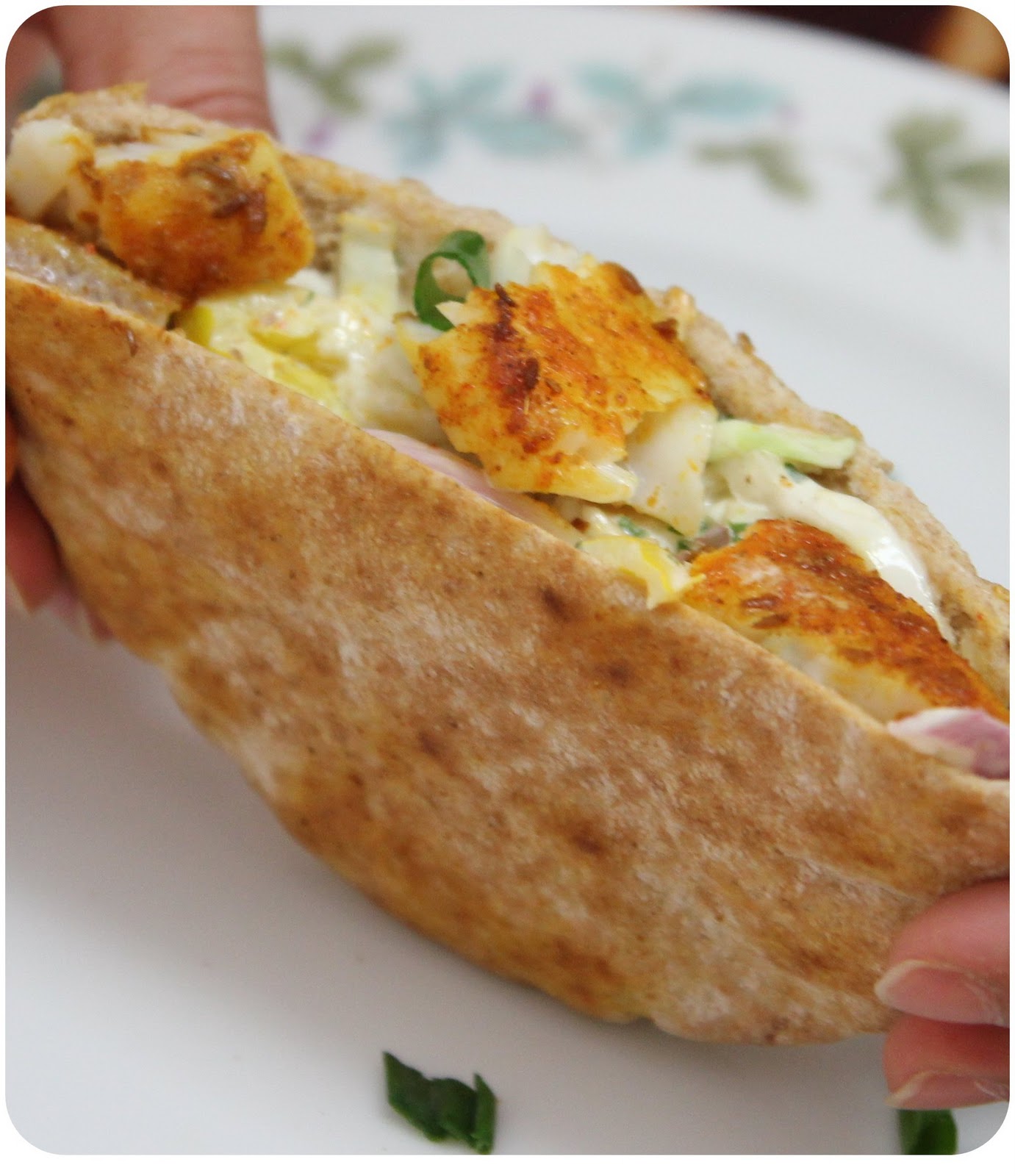 The Spice Rack Pita Pockets filled with fish, cabbage and mayo sauce