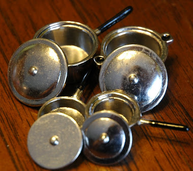 silver pots and pans set