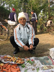 Bishnu peels vegetables