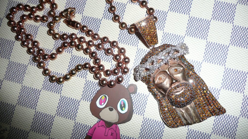YOU SEE THAT CHAIN ? Kanye West Jesus Pieces for days.