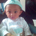 Raka pake baju koki