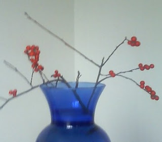 winterberry branches in vase