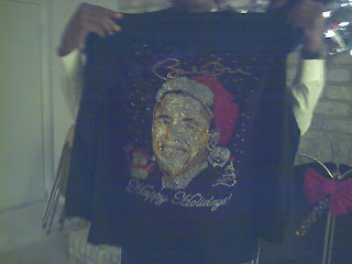 sweatshirt with image of Barack Obama as Santa