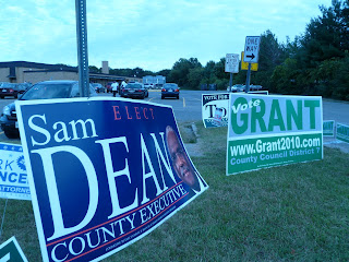 giant Sam Dean campaign sign