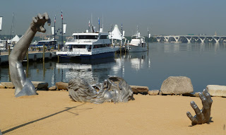 The Awakening statue near marina