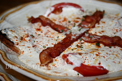 A Kentucky classic from the Brown Hotel in Louisville, a Kentucky Hot Brown is an open-faced turkey sandwich, topped with a rich Mornay sauce and garnished with slices of fresh tomato and crisp bacon.