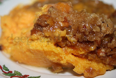 A wonderful side dish combining butternut squash with sweet potato and a praline topping.