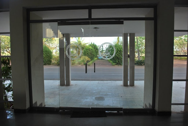 Entrance -glass door with two emblems