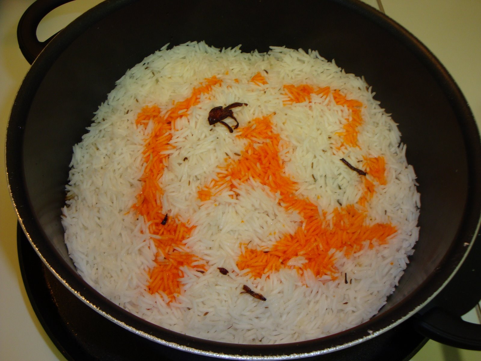 [placingonskillet.JPG]