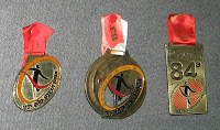 a medalha já ocupa seu lugar de honra ao lado das edições 82 e 83 da corrida