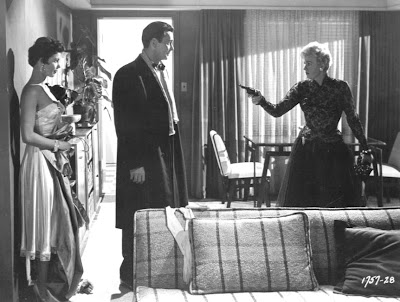 Barry with Colleen Miller (the doll) and a loud pig in Playgirl (1954).