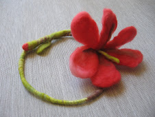 Red flower as a necklace