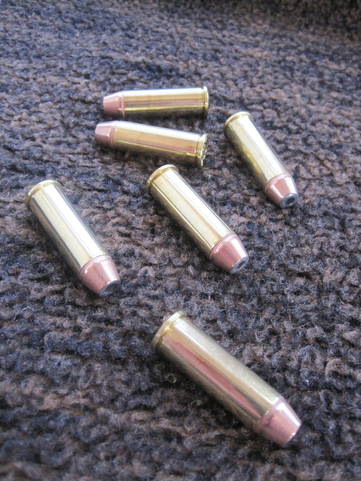 [bullets+on+brown.JPG]