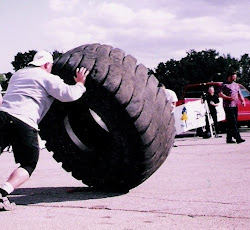 Me competing in the 100ft. Tire Flip