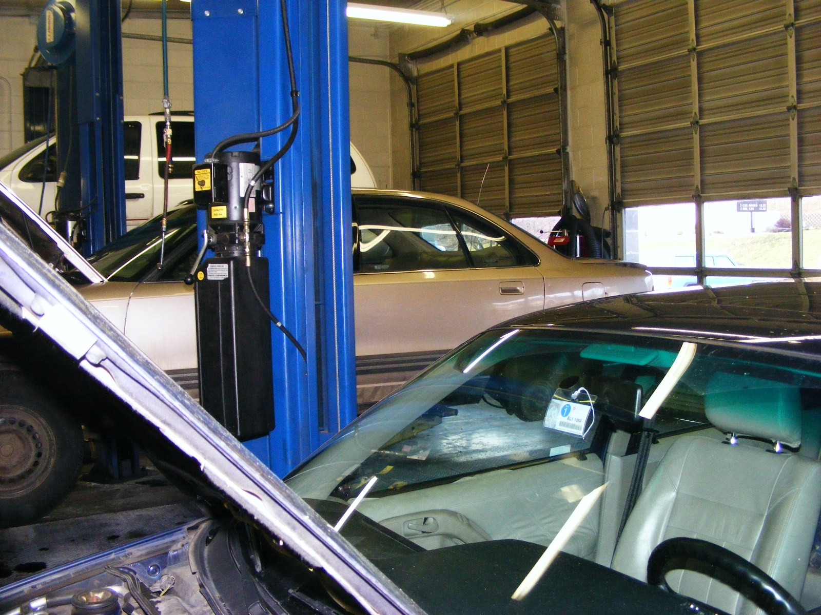 Jerry's Auto Repair shop door I love a busy shop...