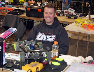 Team Losi Racing driver Lars Johnson (TQ) prepares his L8IGHT for the race