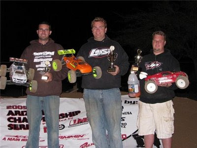 Losi drivers Billy Fischer and Casey Peck finish first and third in the truggy class.
