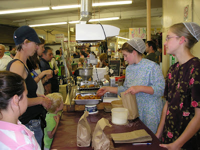 Making fresh doughnuts at the Guelph Farmers Market Making fresh doughnuts at the Guelph Farmers Market