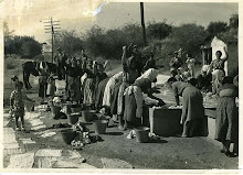 Women washing and saluting