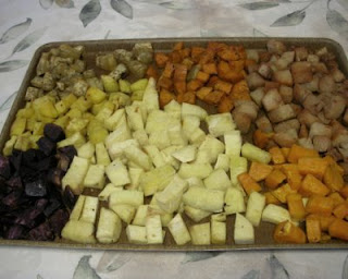 And now roasted -- Upper left = Boniato; Upper center = Red Garnet Yam; Upper right = Tropical Yam; Center left = Japanese Yam; Bottom left = Purple Potat; Bottom middle = Ghana Yam; Bottom right = American sweet potato