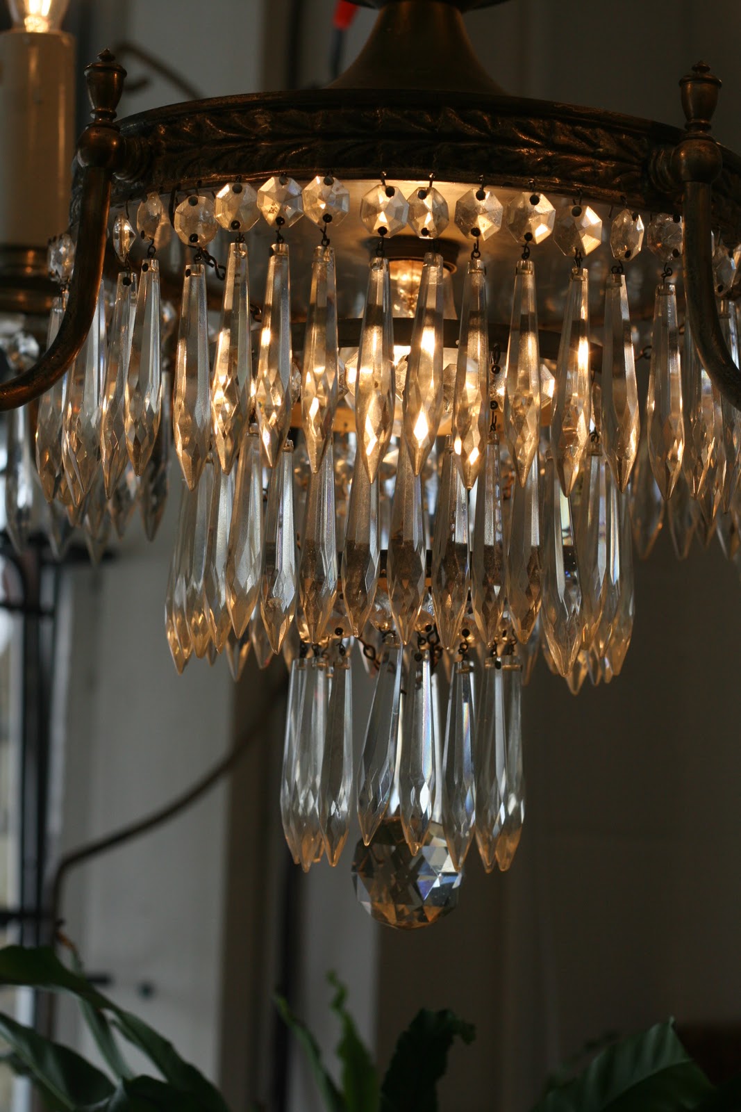 Laurie's Trunk Antiques You can never have too many chandeliers......