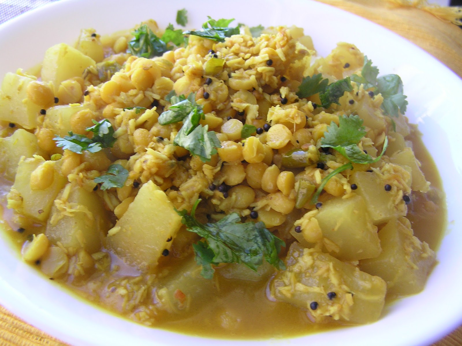 The Melting Pot Green Papaya with Chana Dal & Coconut
