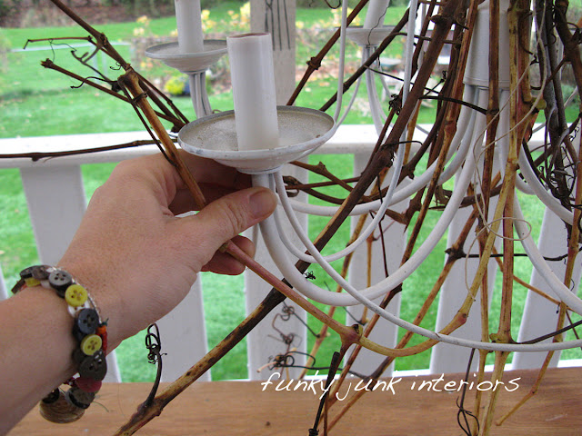 How to DIY a whimsical expensive looking (but FREE) white branch chandelier! It's gorgeous and easy to do! Click for full tutorial. #chandelier #branchchandelier #lighting #diy #rusticdecor