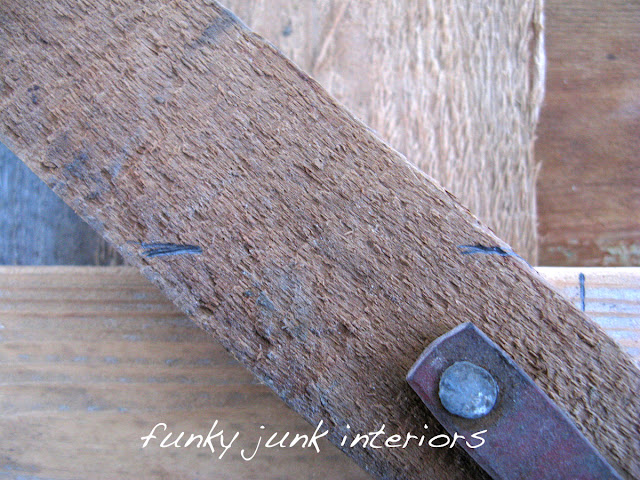 Creating an old gate for the fireplace mantel via https://www.funkyjunkinteriors.net/