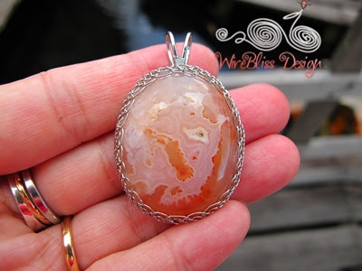 Holding the Netted Agate Pendant
