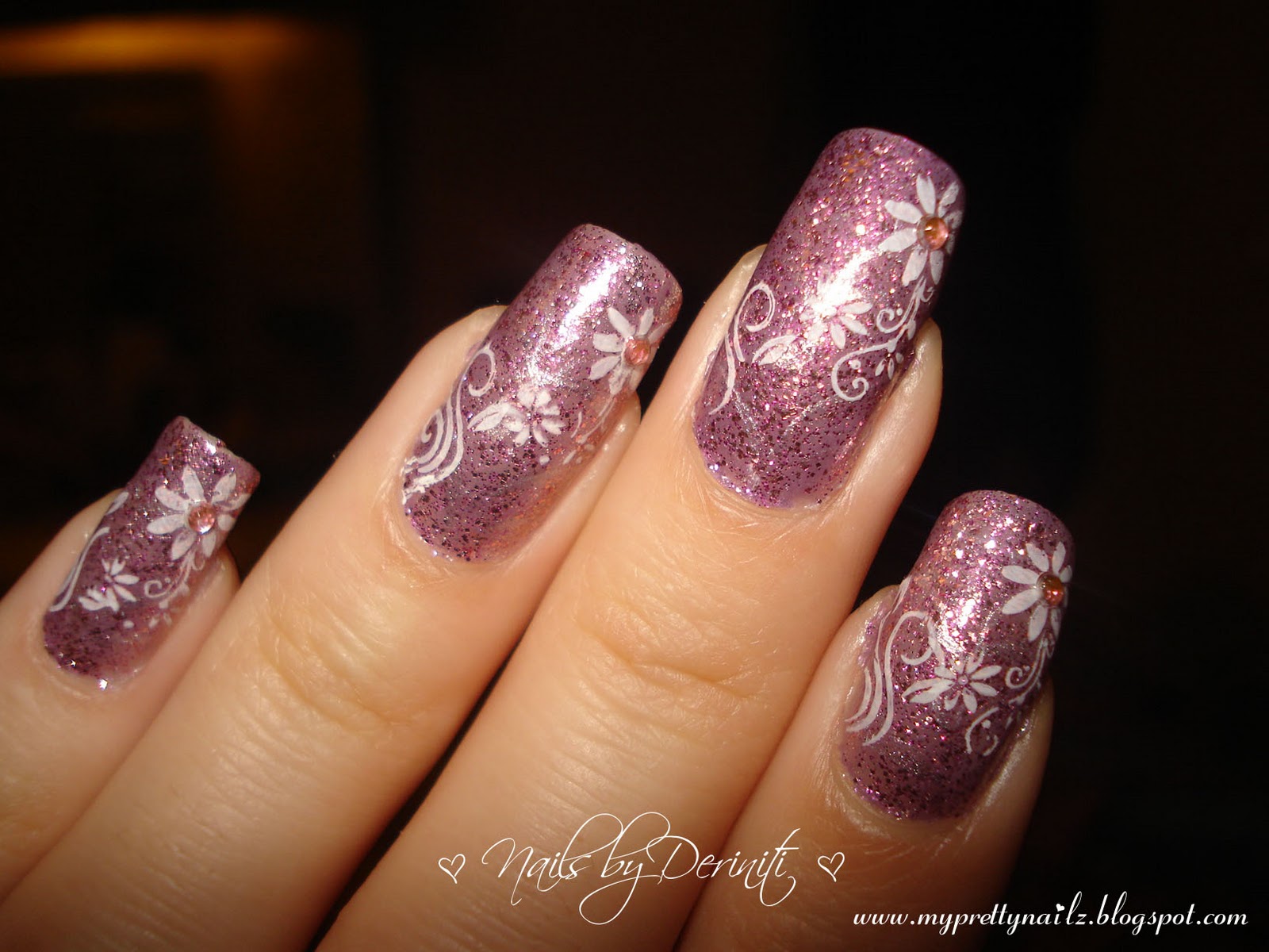 1. Purple and White Floral Nail Design for 2024 - wide 8