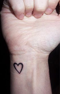 black heart wrist tattoo