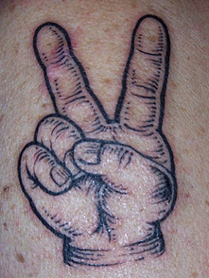 image of Love and peace sign tattoo