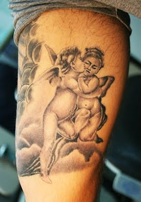 baby angel tattoo pictures,Baby angel tattoo designs have become a rage amongst the feminine gender