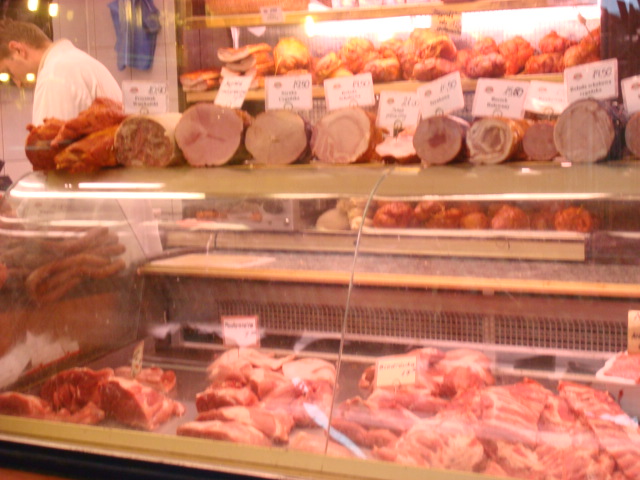 [butcher+at+market.JPG]