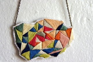 Triangle Explosion necklace by etsy/spinthread