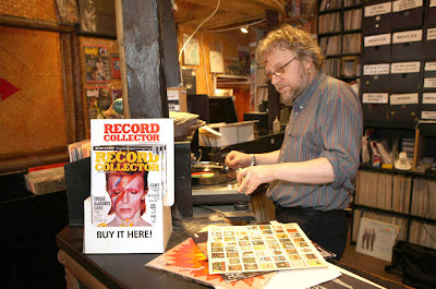 Nick Brown, manager of Intoxica records on Portobello Road, spins some vinyl.