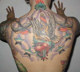 Have you been contemplating on a back tattoo design but do not know where to begin your search? With the tons of resources available online, the process can be overwhelming, seriously! I have experienced it myself and I ended up confused, disappointed and empty-handed after clicking through each and every website I found on the web. The ones that I found are the generic and cookie-cutter type of designs that I would not even want to be tattooed on my body.  Have you thought of looking at books in the library? I am not talking about tattoo magazines or tattoo books because the designs there are definitely not unique anymore. I am referring particularly to books with colored pictures, artworks or illustrations of the design you have in mind. For example, if you are thinking of a flower tat design, refer to coffee book tables in the library that have beautiful pictures that can serve as inspiration for your tattoo theme. If you want a zodiac sign tat, refer to astrological books that have illustrations of symbols and glyphs related to your sign. I am sure it would be not hard to find books in your local library or bookstore to serve as your reference.  The second place is the tattoo studio wherein you can request your artist to sketch a back tattoo design for you. He can draw an image for you based on the concept you have in mind and instantly, you can finally have a unique design for your body. A skilled tattoo artist can turn your vision into reality without the worry of sporting something you share with thousands of other people. 