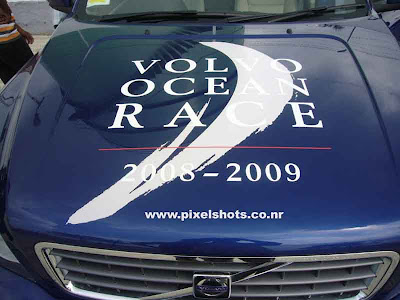 volvo ocen race emblem on the bonnet of volvos suv xc60,volvos photographed from race village cochin kerala, ocean race volvo, blue Volvo xc90 bonnet