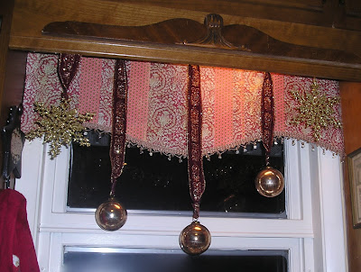 Ornaments hanging above window