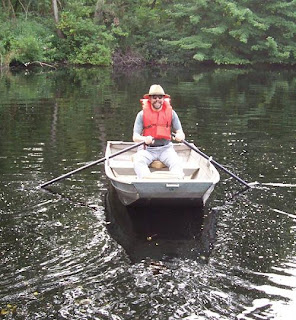 Koyzis in rowboat