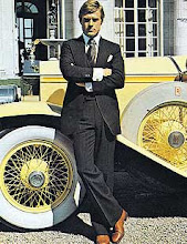 Jay Gatsby in front of his car
