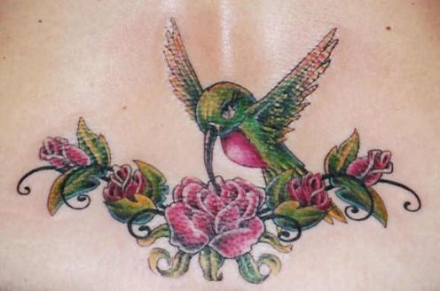 Hummingbird tattoos are wonderful little female tattoos when accompanied by 